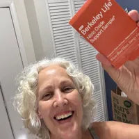 Customer-uploaded image holding Berkeley Life package